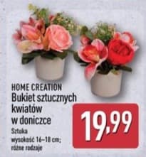 bukiet sztucznych kwiatów w doniczce